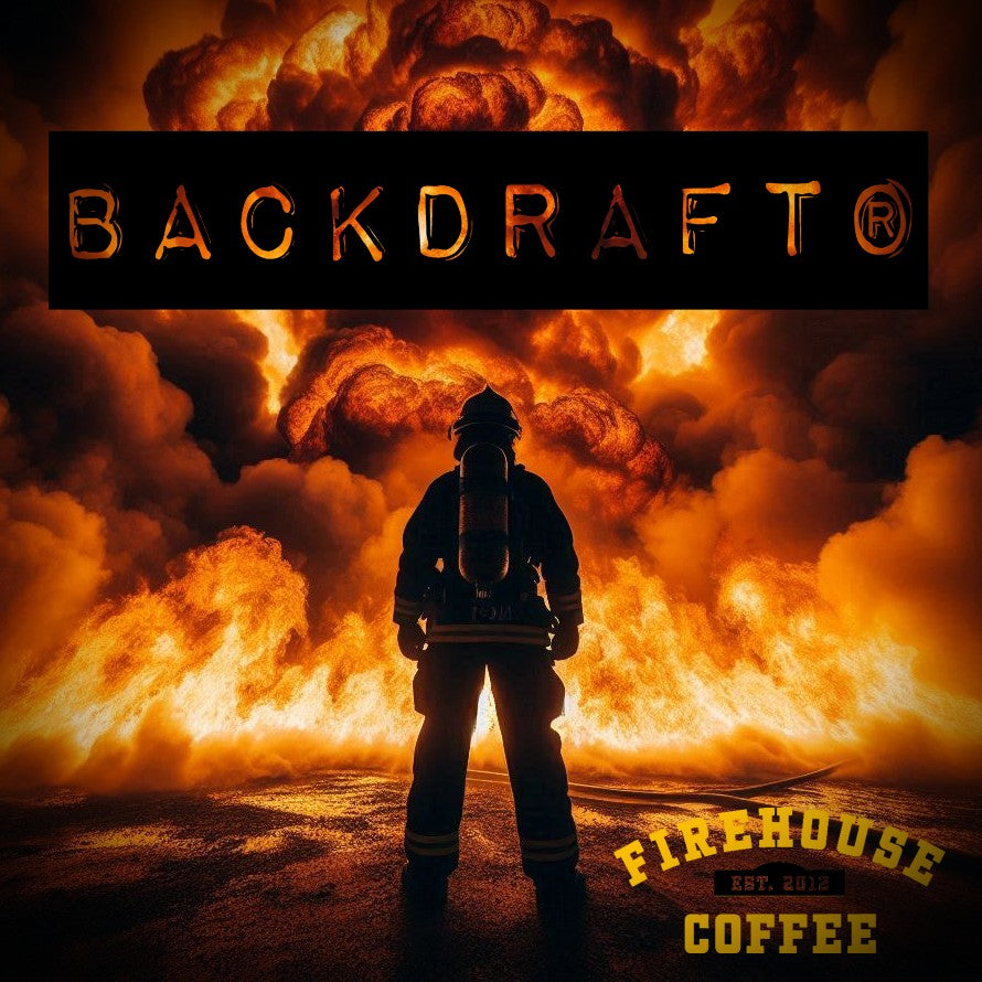 Firefighter standing in front of backdraft fire