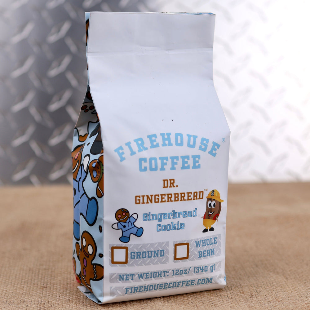 Firehouse Coffee Gingerbread Cookie Flavored Coffee in a 12 oz white coffee bag featuring warm gingerbread cookie flavors with notes of cinnamon, ginger, and sweet holiday spices. The package showcases gingerbread cookie graphics, Firehouse Coffee branding, and options for ground or whole bean coffee.