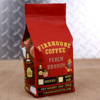 Firehouse Coffee Peach Brandy Flavored Coffee with sun-ripened peach and smooth oak-aged brandy flavors.