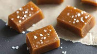 Caramel candies topped with salt crystals